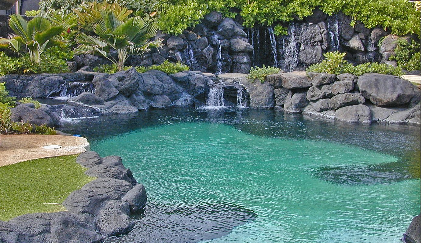 Hawaii water features: waterfalls into pool.