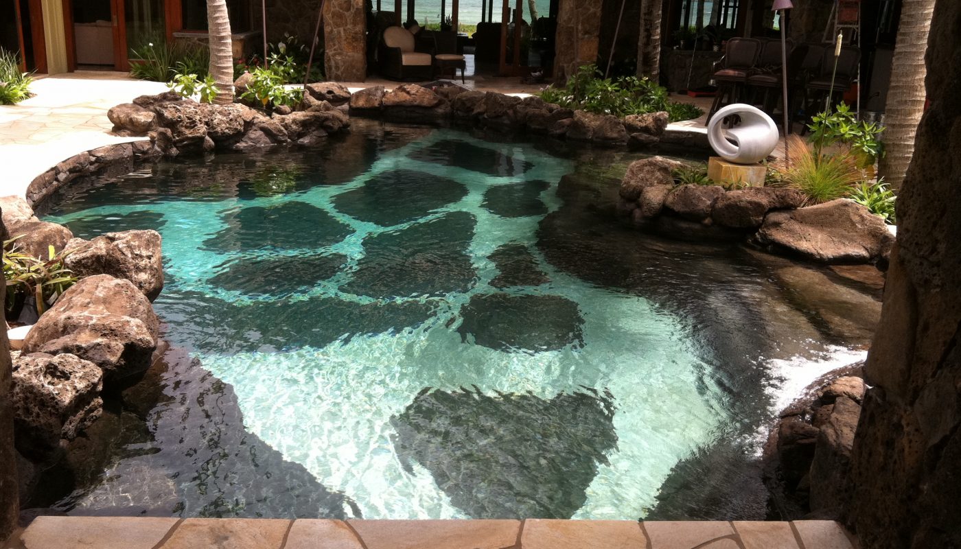 Photo: island-style swimming pool for indoor-outdoor living