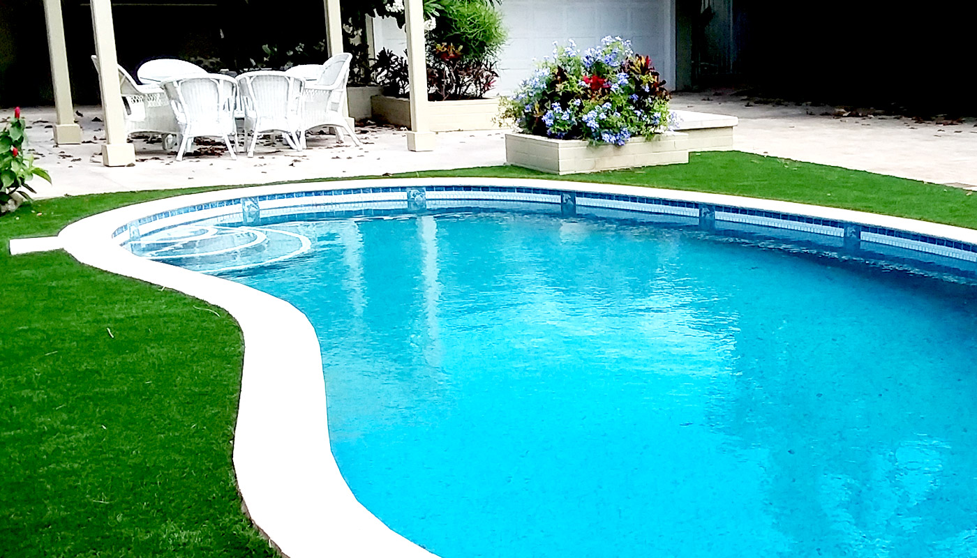 Slideshow: building a residential kidney-shaped swimming pool, from start to finish.