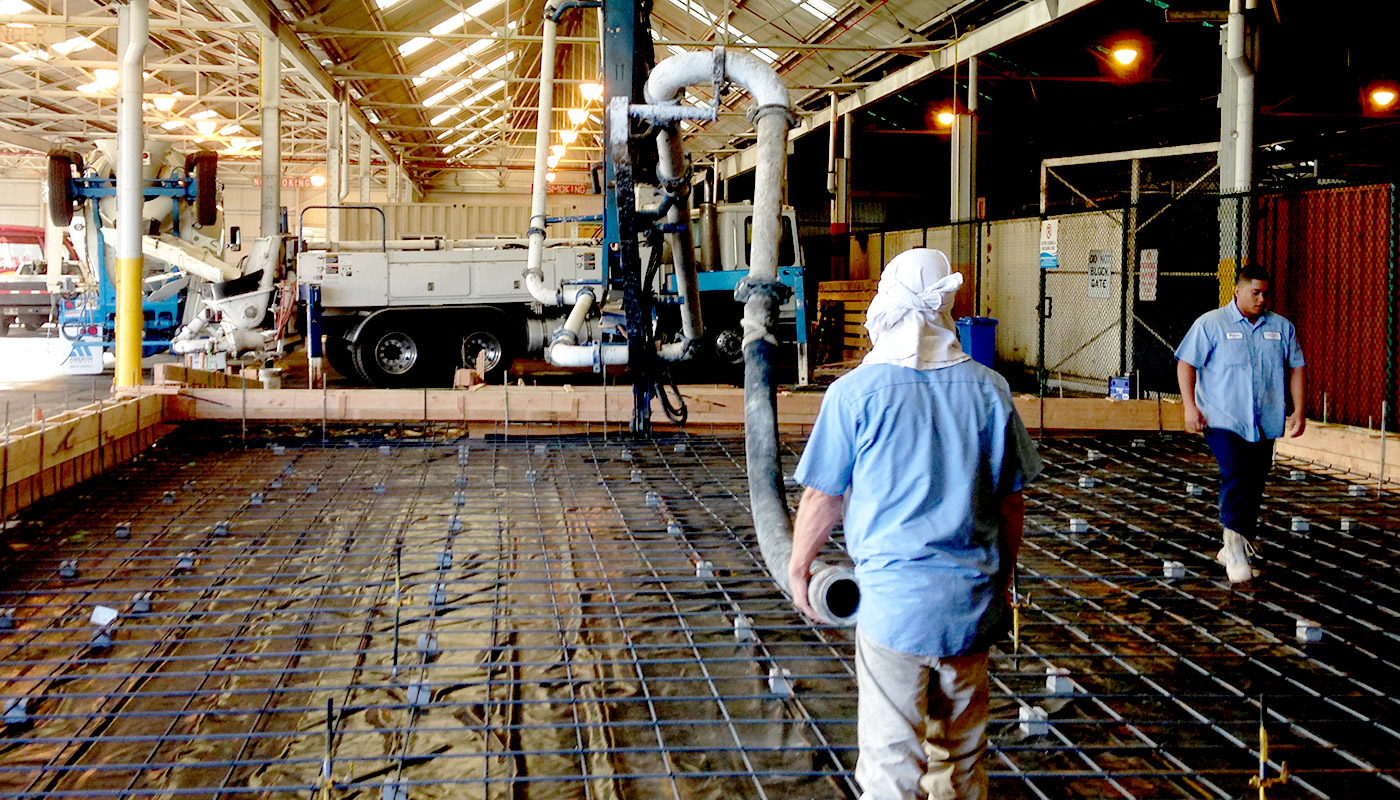 Photo: pumping concrete for industrial cement floor for Chinatown fish market (Honolulu, Oahu, Hawaii)