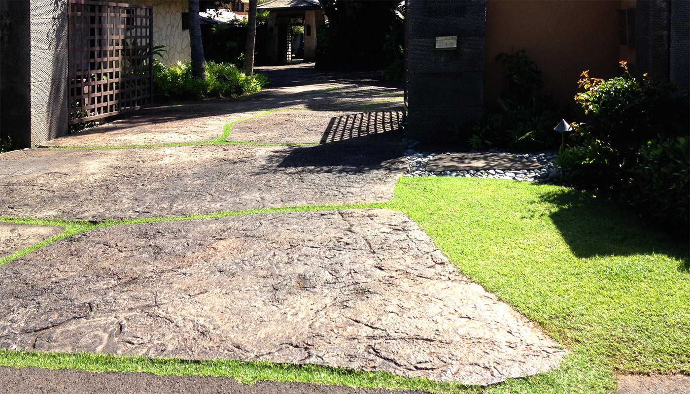 Photo: custom driveway, concrete looks like very large paving stones