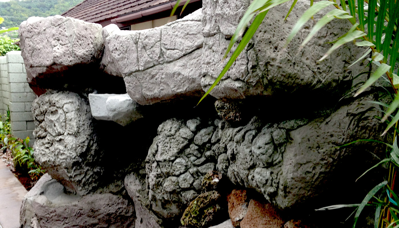 Slideshow: building a custom water feature, shotcrete boulders and waterfall.