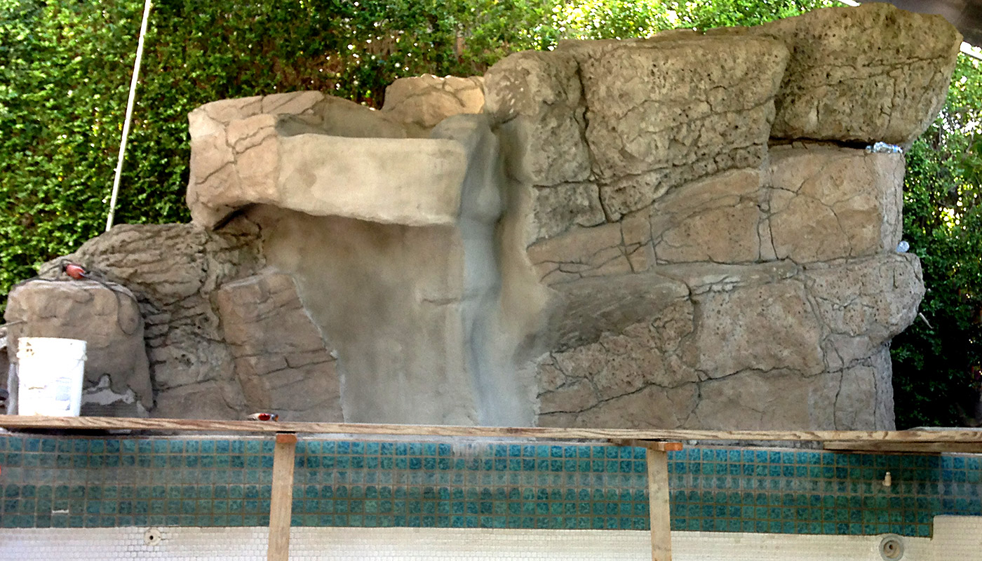 Photo: swimming pool retrofit, add waterfall feature