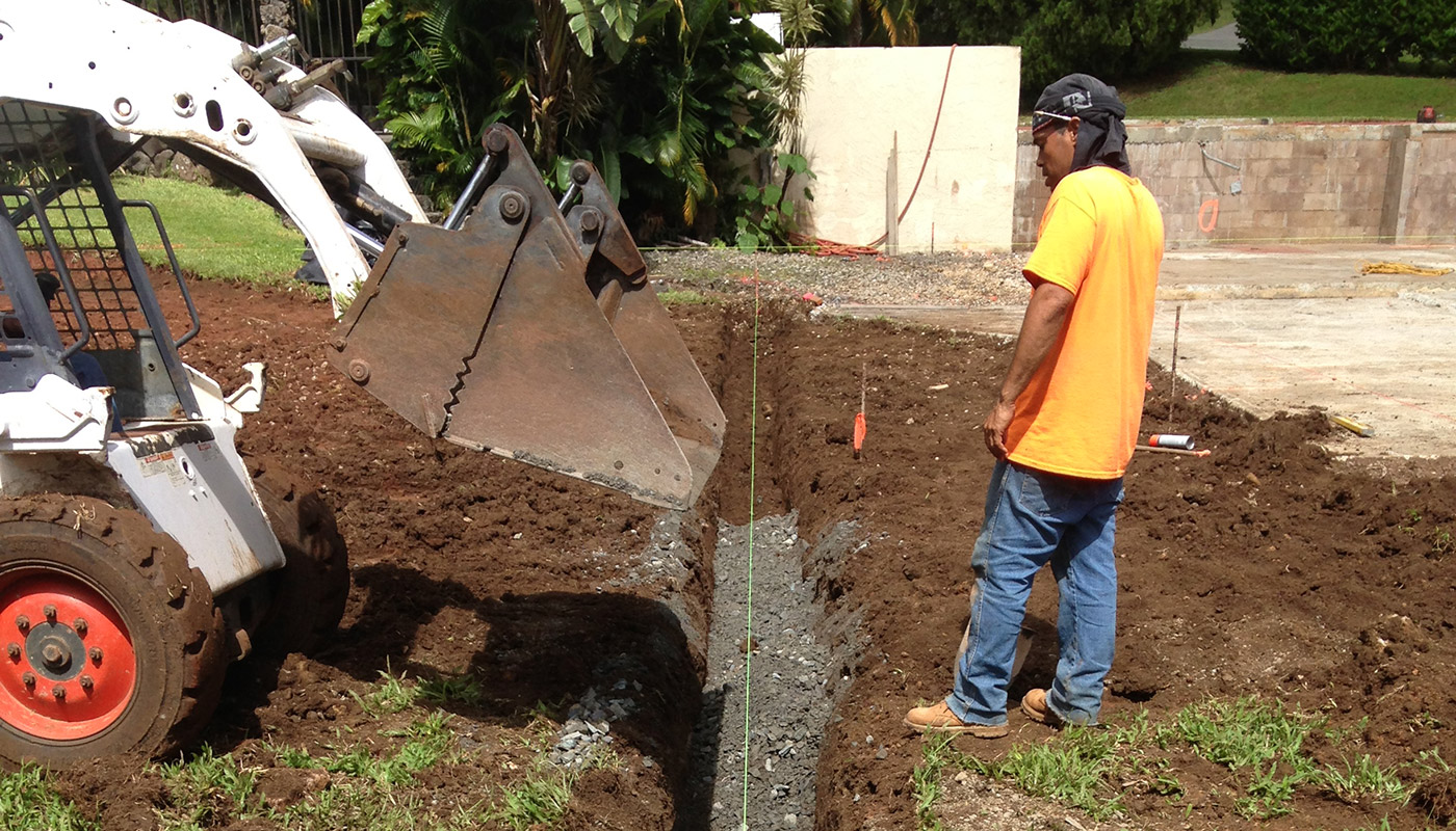 Photo: concrete slab foundation and flatwork for Haiku residence.