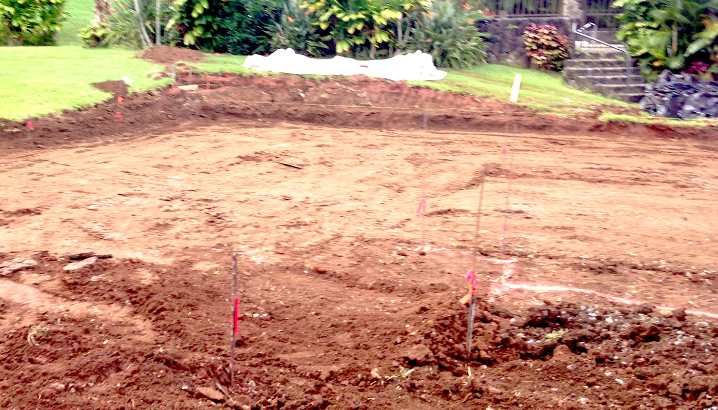 Photo: concrete slab foundation and flatwork for Haiku residence.