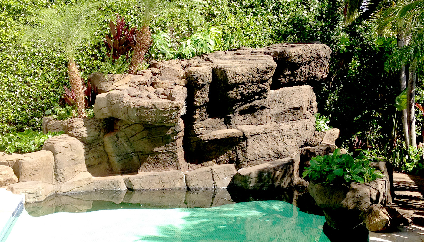 Photo: swimming pool retrofit, add waterfall feature