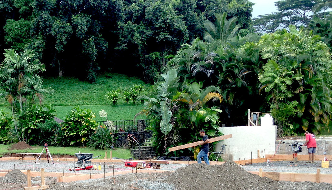 Photo: concrete slab foundation and flatwork for Haiku residence.