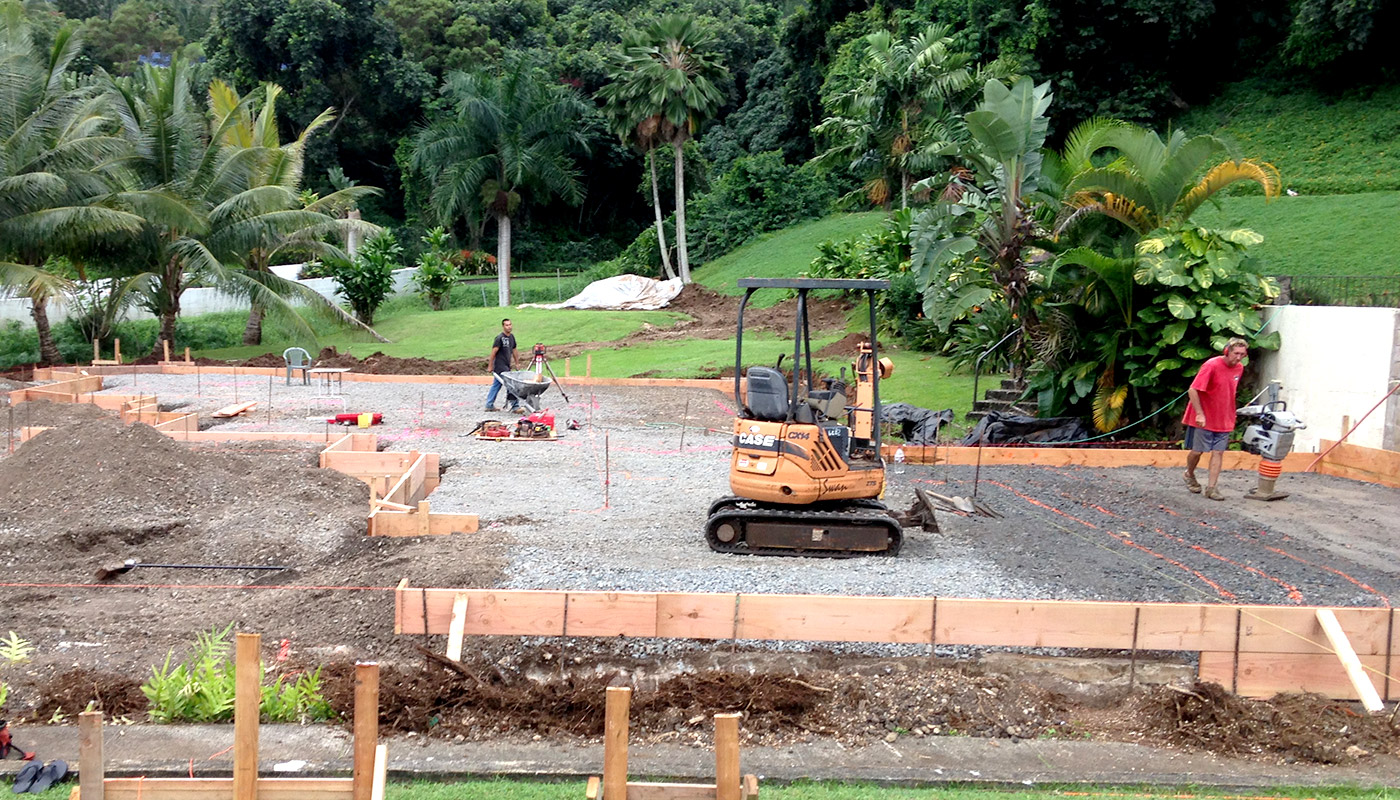 Photo: concrete slab foundation and flatwork for Haiku residence.