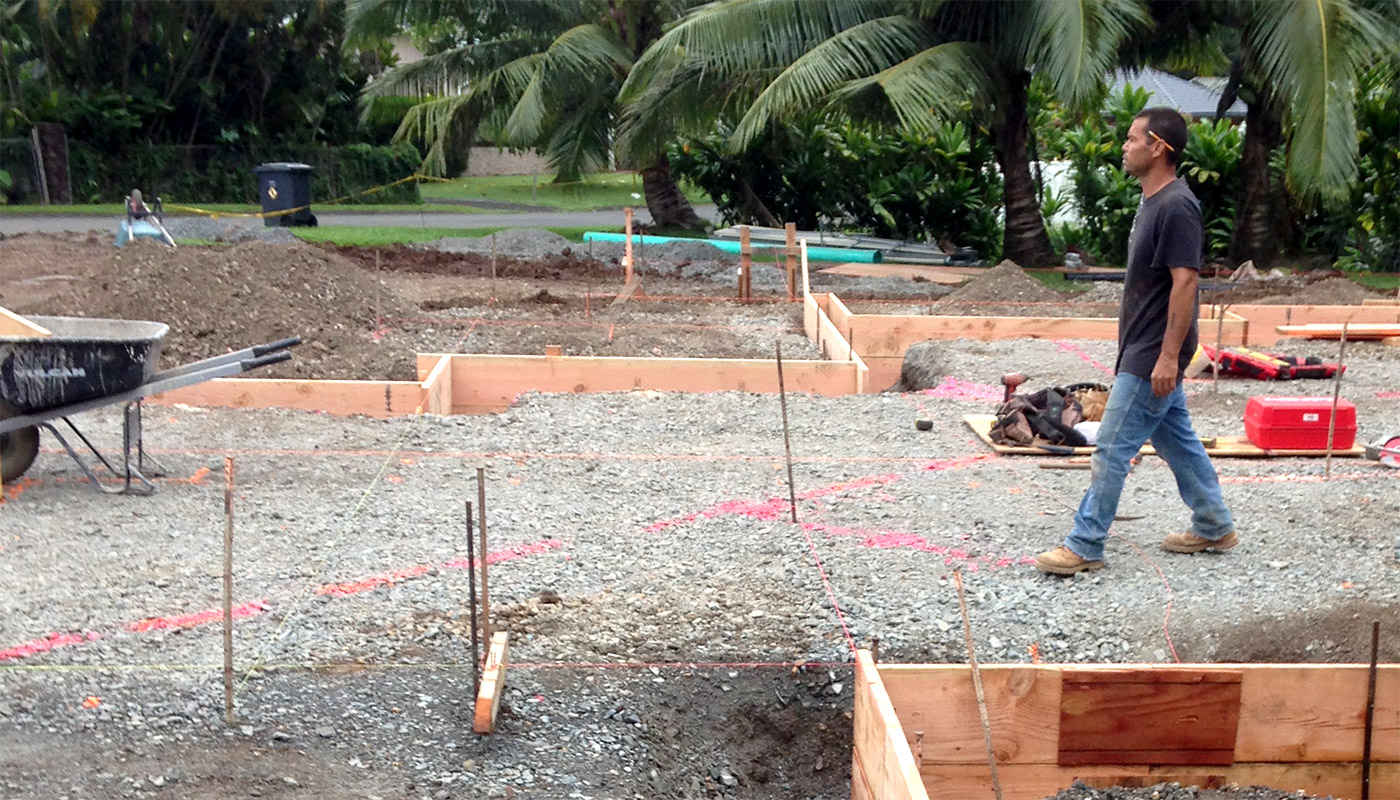 Photo: concrete slab foundation and flatwork for Haiku residence.