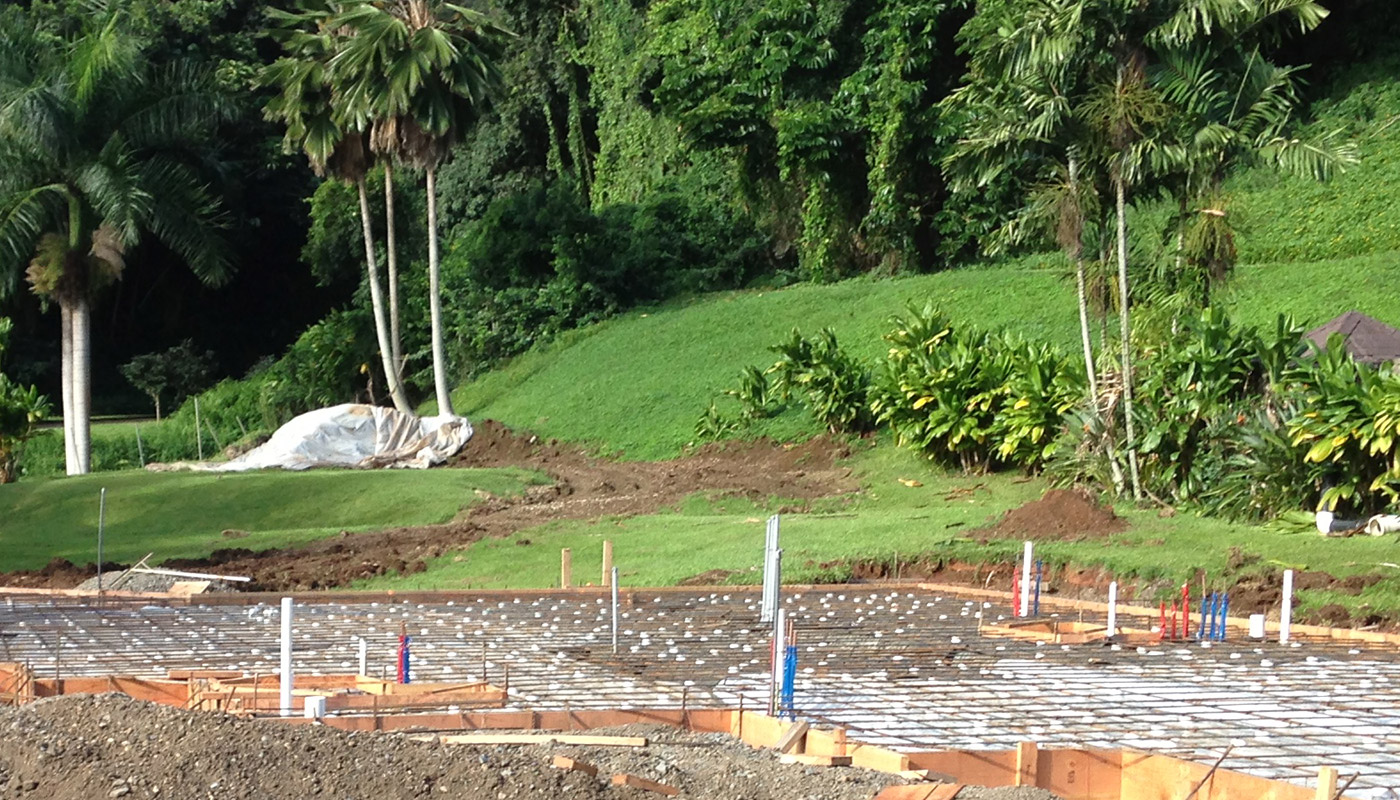 Photo: concrete slab foundation and flatwork for Haiku residence.