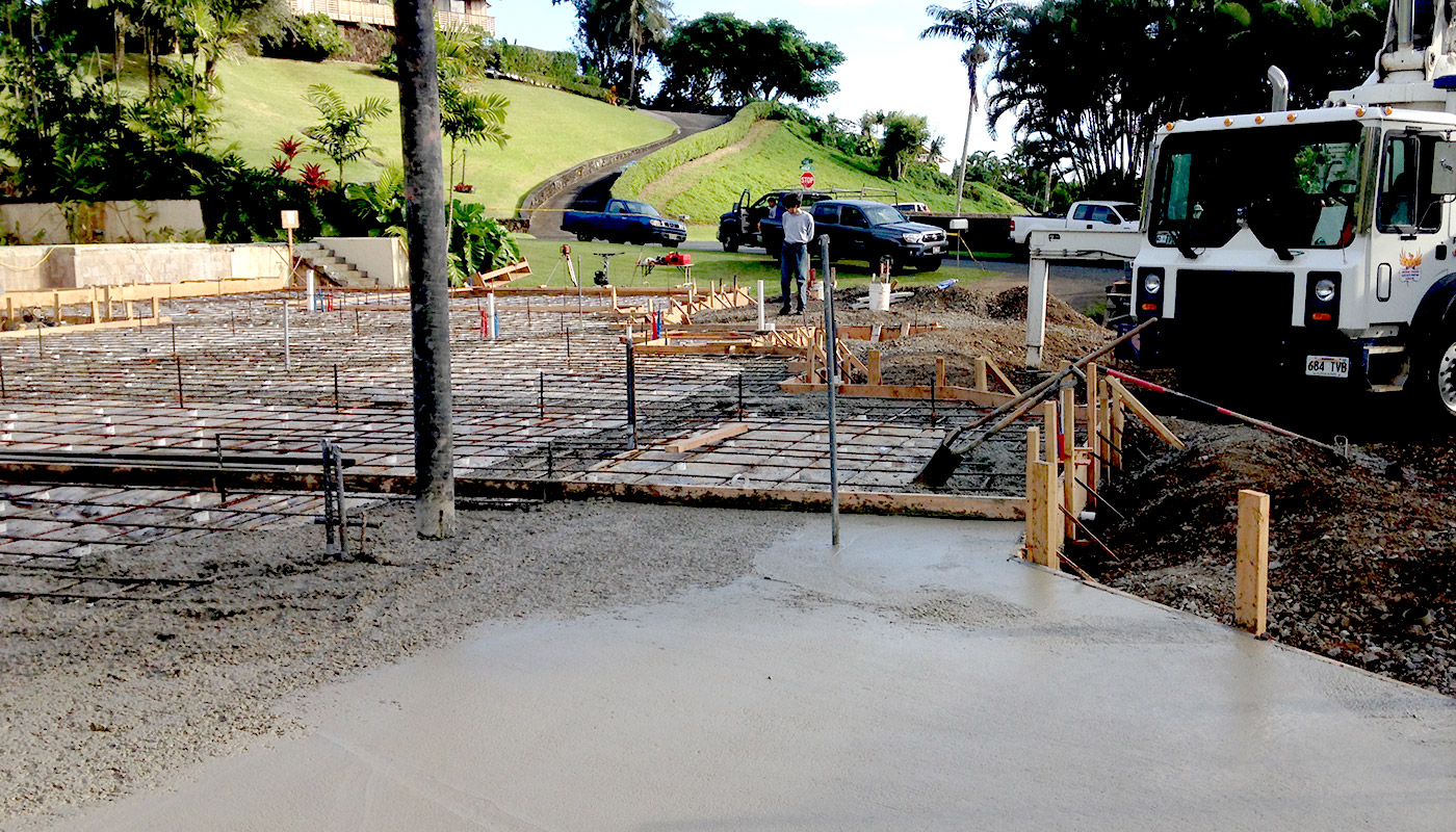 Photo: concrete slab foundation and flatwork for Haiku residence.