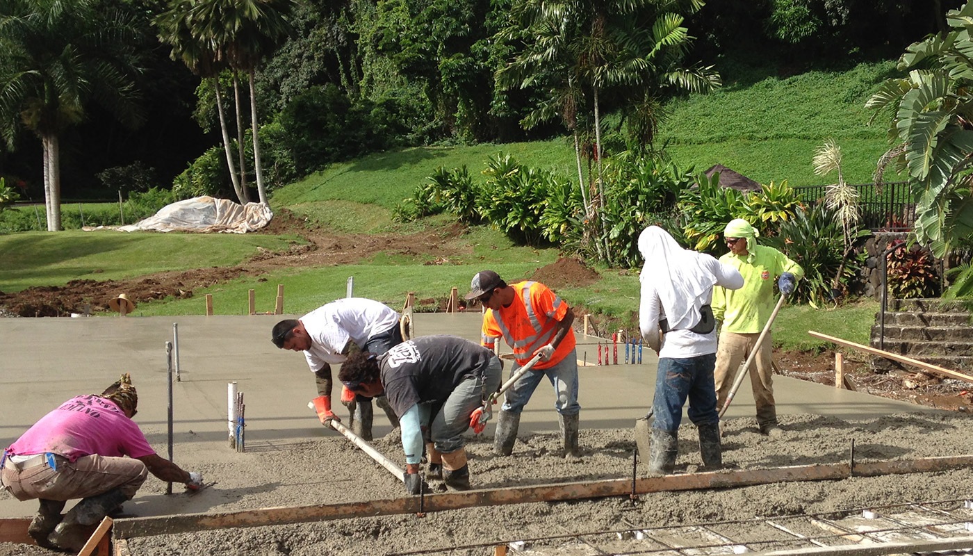 Photo: concrete slab foundation and flatwork for Haiku residence.