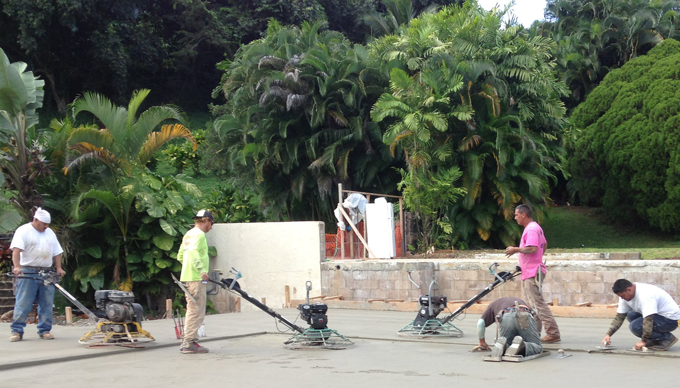 Photo: concrete slab foundation and flatwork for Haiku residence.