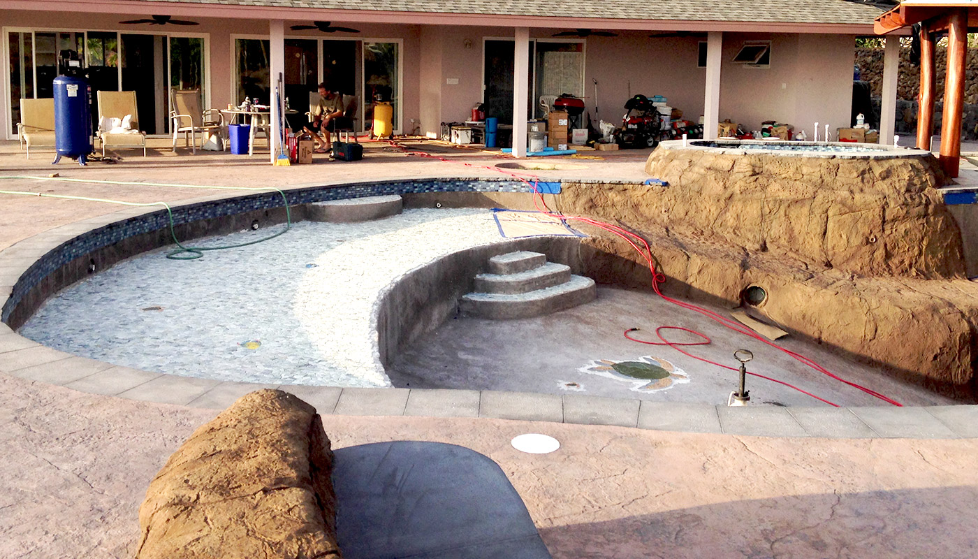 Slideshow: installing a new hillside swimming pool in Kailua-Kona on Hawaii Island.