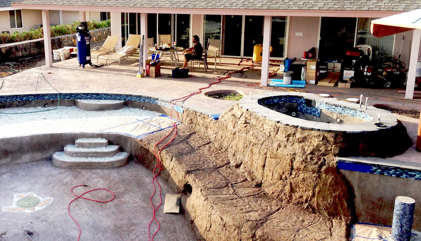 Slideshow: installing a new hillside swimming pool in Kailua-Kona on Hawaii Island.